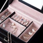 Jewelry box with white gold and silver rings